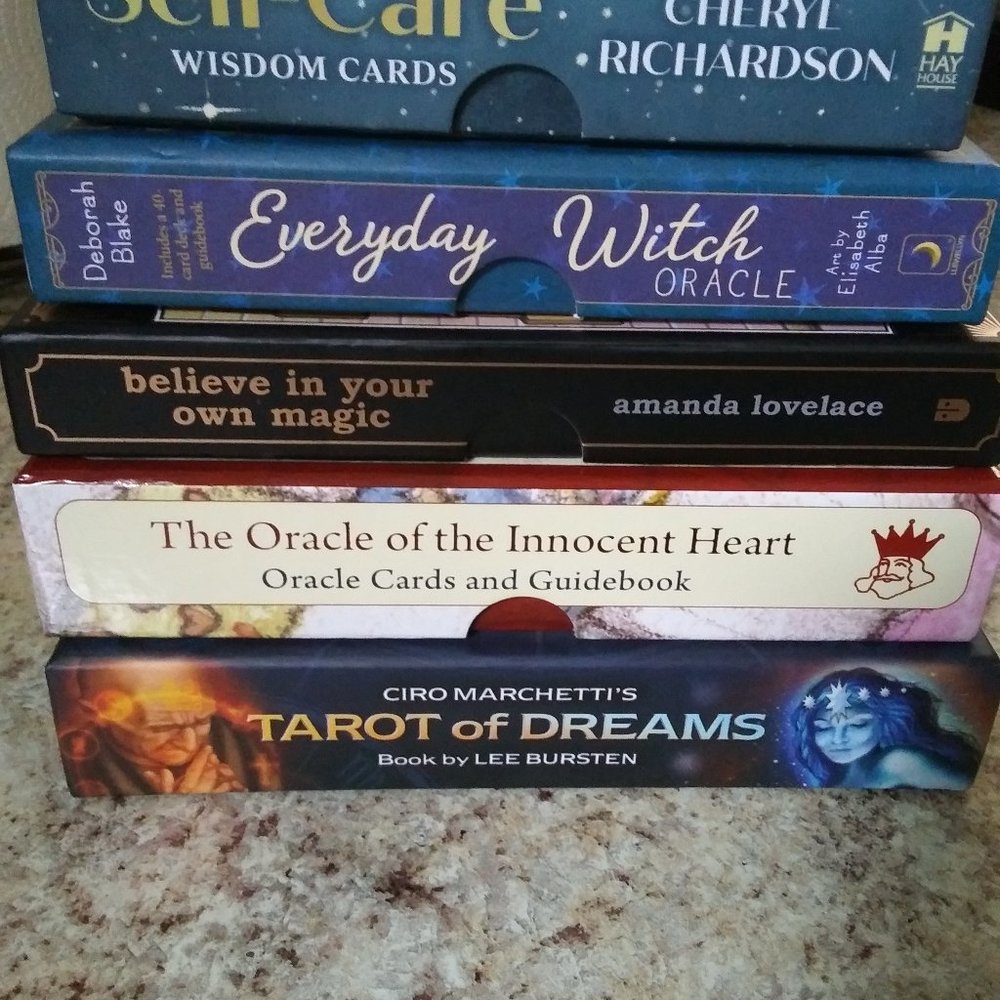 SET OF FIVE TAROT/ORACLE DECKS.